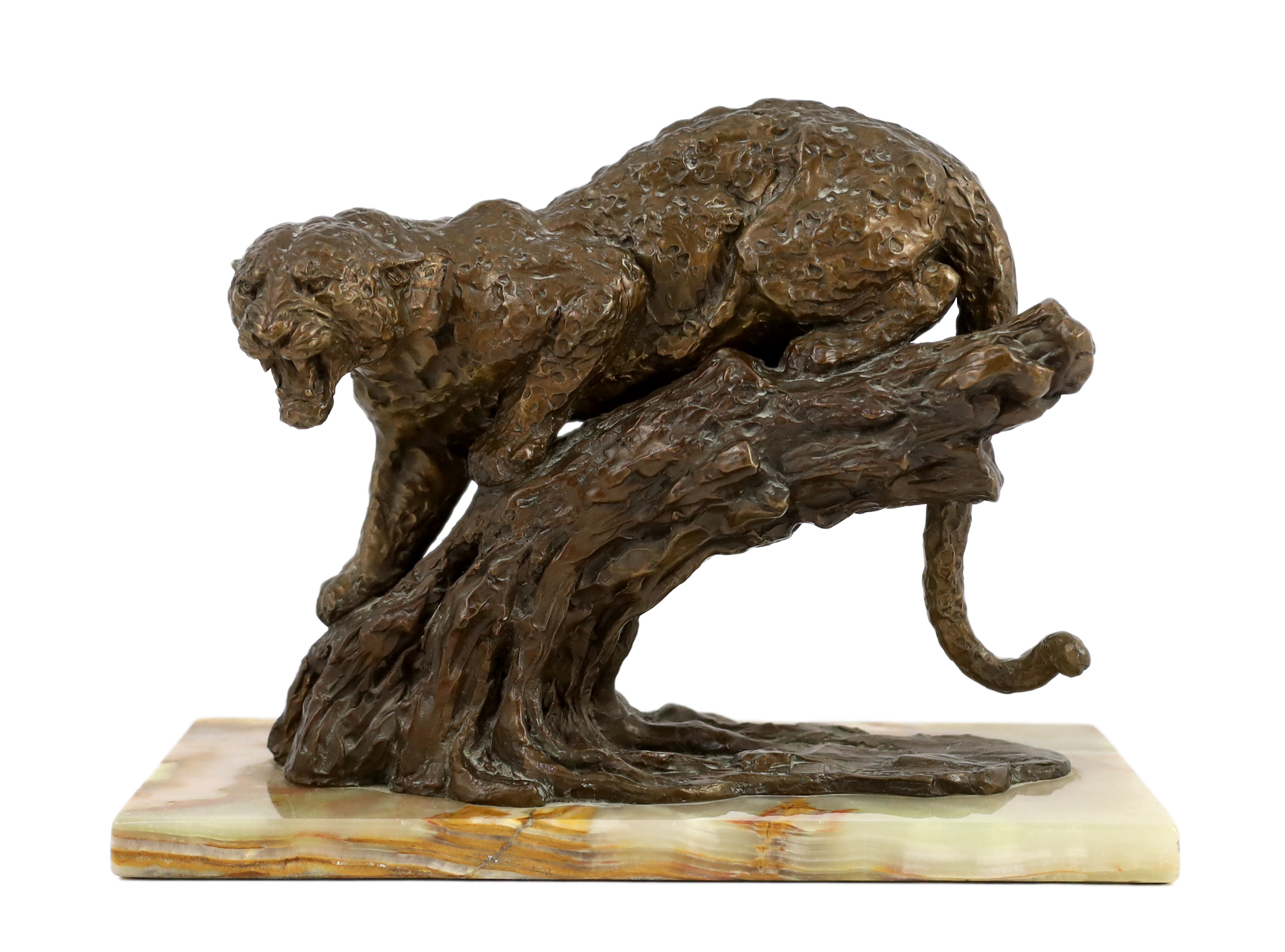 William Timym (British, 1902-1990). A bronze model of a jaguar crouched upon a tree trunk, signed in the bronze with Morris Singer foundry stamp, on green onyx plinth, 34.5cm long, deep 16cm, 25cm high